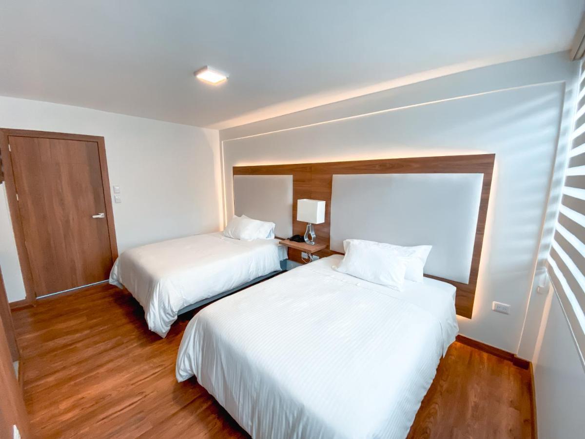 Hotel Miraflores Ambato Bagian luar foto