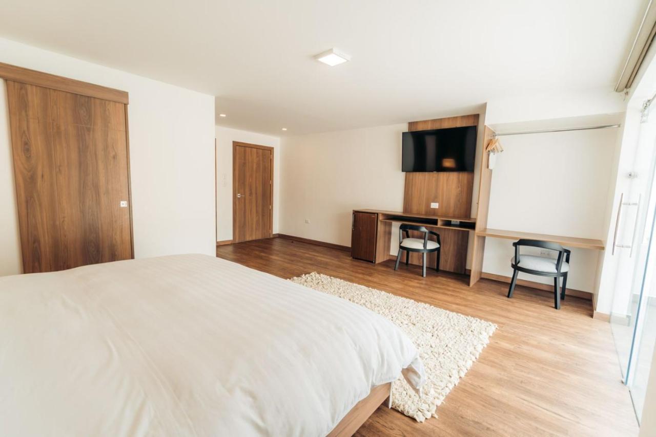 Hotel Miraflores Ambato Bagian luar foto